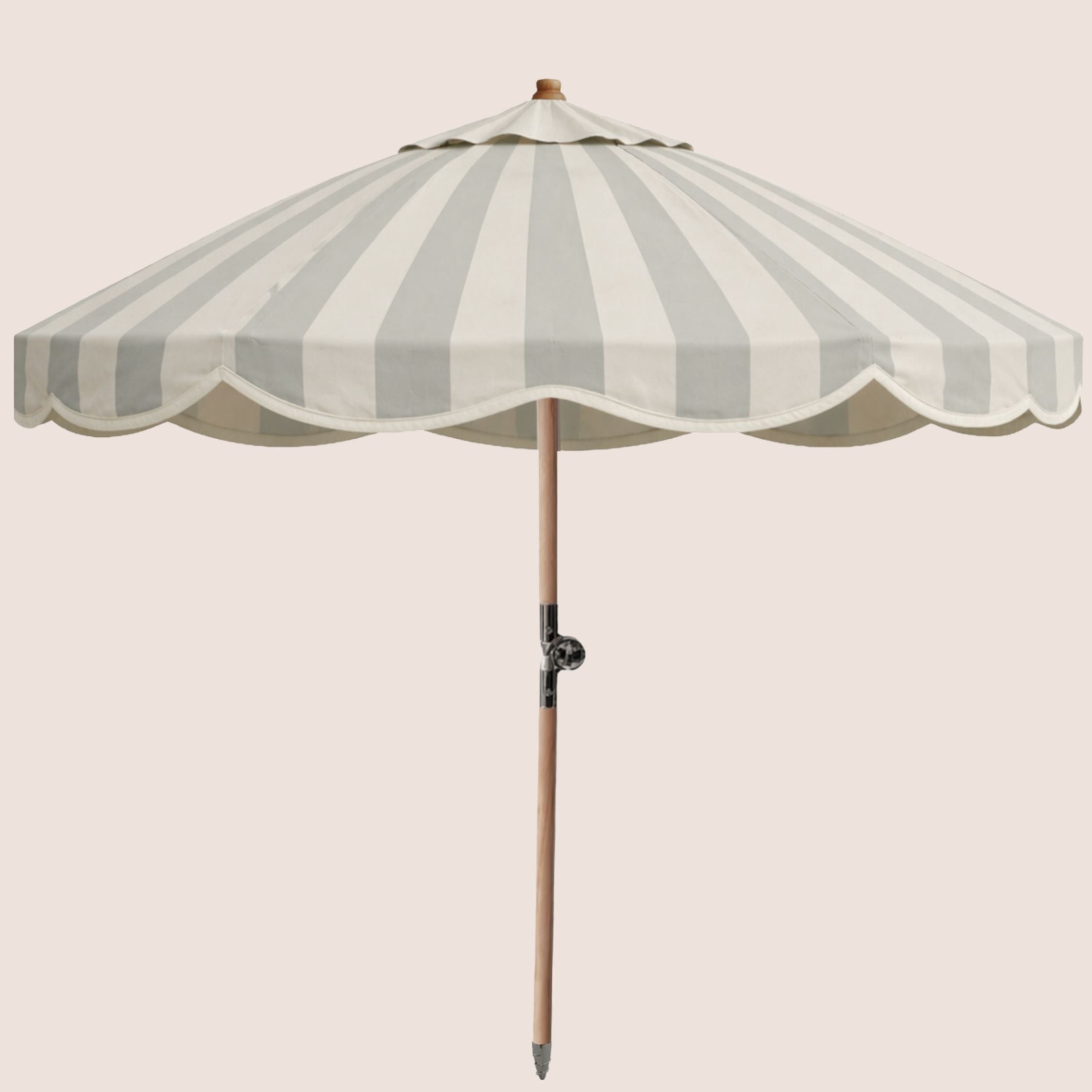 A classic patio umbrella with alternating light beige and green greyvertical stripes, featuring a scalloped edge, a natural wood pole, and a metal tilt hinge