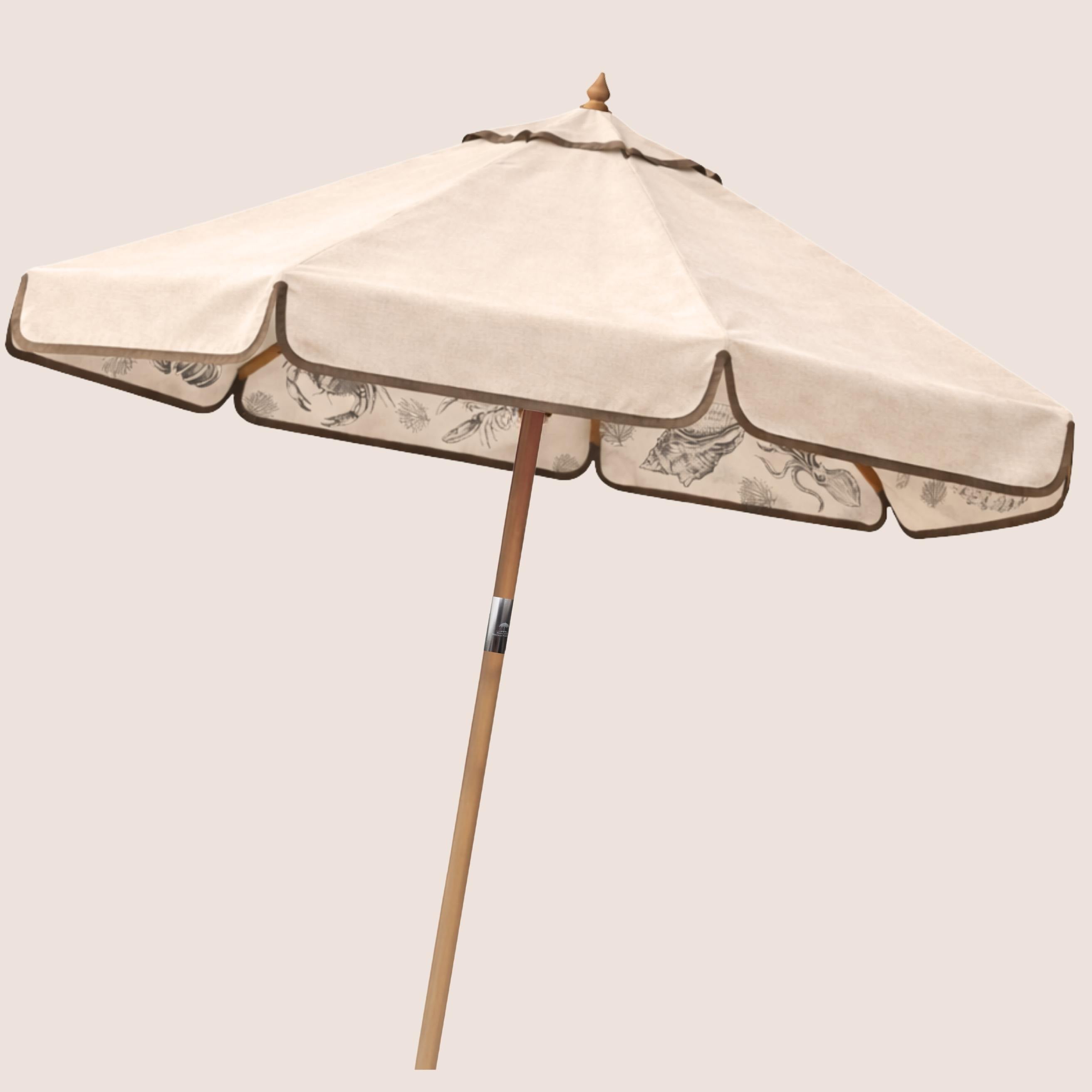 Oyster Shell Harbour Bounty coastal-inspired garden parasol featuring coral and shell illustrations.