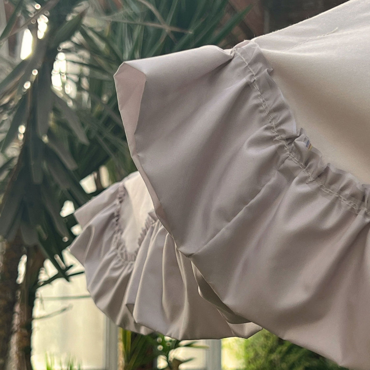 Close up view of gathered silk frill on the Porcelain Veil Parasol 
